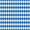 Seamless harlequin pattern background in blue.