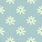 Seamless herbal pattern with chamomile geometric shapes. White flowers on blue background with dots