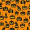 Seamless illustration on the theme of Halloween, different shapes dark pumpkin on orange background