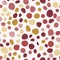 Seamless isolated circle spot geometric pattern. Red, maroon, yellow, ocher color shapes on white background