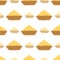 Seamless isolated pattern with basket cream silhouettes. Sweet tasty bakery print in yellow tones on white background