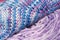 Seamless knitted patterns in pastel colors fragment close up