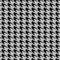 Seamless knitted woolen pattern Houndstooth. Black and white hounds tooth check
