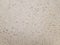 Seamless light brown terrazzo with white and gray random size pebble / seamless pattern / backgropund texture