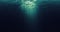 Seamless loop of deep blue and green ocean waves from underwater background, light rays shining