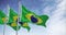 Seamless loop in slow motion of Three Brazil national flags waving