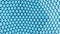 Seamless looping abstract triangle pattern glowing light blue network background