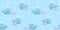 Seamless marine pattern with mother whale and baby whale on a blue background with bubbles