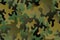 Seamless military camouflage skin halftone dotted pattern vector for decor and textile. Ornamental pointed army masking design