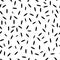 Seamless modern pattern with elements of rice black grains on a white background. Printing on fashionable fabrics, textiles