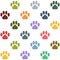 Seamless multicolored cat paws pattern