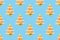 Seamless New Year`s pattern from Christmas tree toy in form of spruce tree made of cookies on blue background