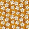 Seamless orange background with white anemones