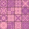 Seamless patchwork pattern from square patches in purple tones.