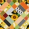 Seamless patchwork pattern with sunflowers, white chamomile flowers and geometric ornament.
