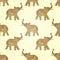 Seamless pattern with abstract elephants of glitter. Their trunks raised up - good luck symbol