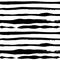 Seamless pattern from abstract long narrow textural strokes of black thick paint