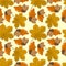 Seamless pattern with acorns and oak, chestnut autumn leaves.