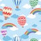 Seamless pattern with air balloons and rainbow. Wallpaper for children room