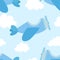 Seamless pattern of airplane image and clouds in blue shades. Illustration for a boy at a baby shower party. Background for greeti