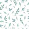 Seamless pattern with aquamarine and blue branches and leaves on a white background