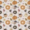 Seamless pattern with autumn leaves, donuts, coffee and pumpkins