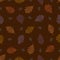 Seamless pattern from autumn vintage leaves of northern red oak on a brown background
