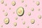 Seamless pattern avocado on light pink background