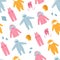 Seamless pattern of baby winter clothes. Colorful winter coat, overalls, snow suit, jumpsuit, hats and mittens. Doodle