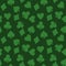 Seamless pattern background of green poker suits - hearts, clubs, spades and diamonds - on green background. Casino