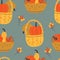 Seamless pattern of baskets with pumpkins, squash, gourds and fall berry on dark blue background.