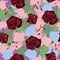 Seamless pattern with beautiful burgundy roses on colorful background of brush strokes.