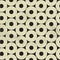 Seamless pattern of beige circles on black paper