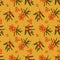 Seamless pattern with berries and branches of sea buckthorn. Sea buckthorn on a yellow background. Fashionable textile, fabric, pa