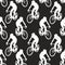 Seamless pattern with bicyclists on a black background