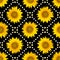 Seamless pattern with big bright sunflowers and brown dots on black background.