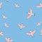 Seamless pattern with birds in trendy colors rose quartz and serenity