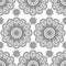 Seamless pattern with black mehndi floral henna lace buta decoration items in Indian style.