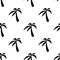 Seamless pattern with black silhouette palms. Isolated on white background.