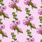 Seamless pattern with blossoming bouquets  of pink mallow flowers and green leaves. Hand drawn ink and colored sketch.