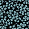 Seamless pattern with blossoming Japanese cherry sakura branches.Azure flowers on black background