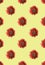 Seamless Pattern of Blossoming Red Sunflowers on Yellow Backdrop