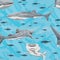 Seamless pattern with blue background, fishes and whale sharks Rhincodon typus in different angles.