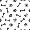 Seamless pattern - bones and traces of paws