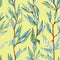 Seamless pattern of branches with narrow long leaves on a yellow background. graphic drawing