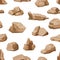 Seamless pattern of brown rock stones and boulders