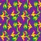 Seamless pattern with cartoon parrots on purple background. Vector image