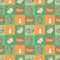 Seamless pattern with cat kitten on a green-orange checkered background