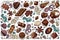Seamless pattern with chocolates, chunks of chocolate, candies in colored wrappers on blue background. dessert