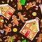 Seamless pattern christmas cookies gingerbread man and girl near sweet house decorated with icing dancing and having fun